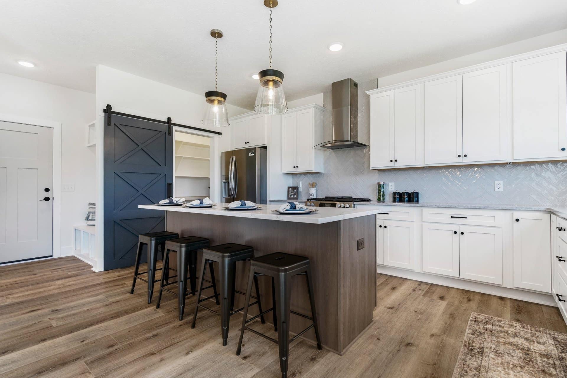 barn-door-pantry-white-kitchen-hartville-ohio-builder