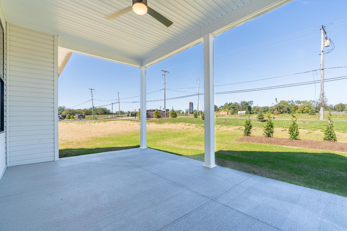 covered-front-porch-farmhouse-style-custom-home-jackson-township