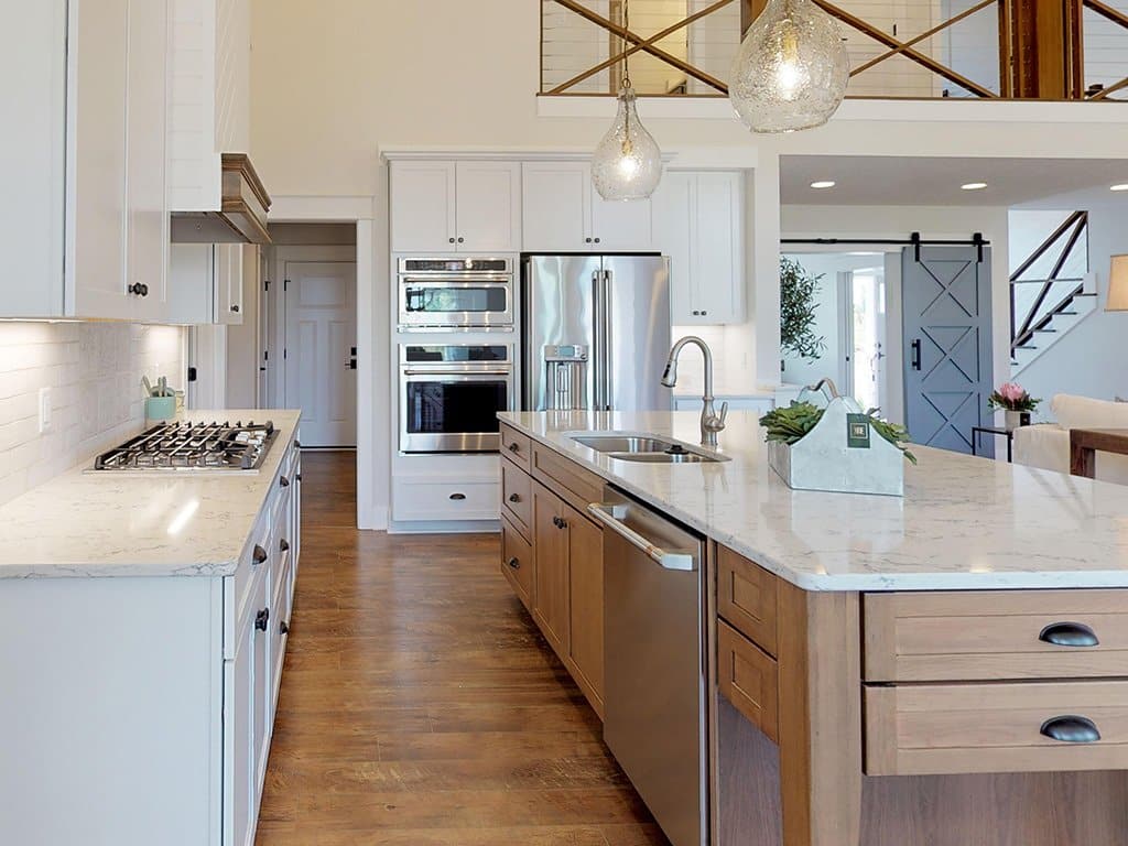 gourmet-kitchen-island-two-tone-cabinets-wood-beams-custom-home-ohio