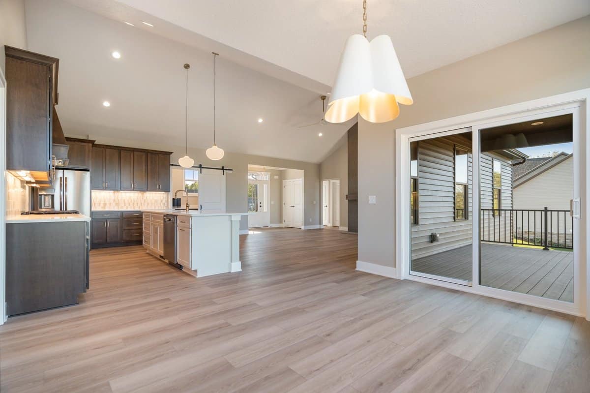 great-room-kitchen-combo-vaulted-ceiling-sliding-doors-summit-county-ohio