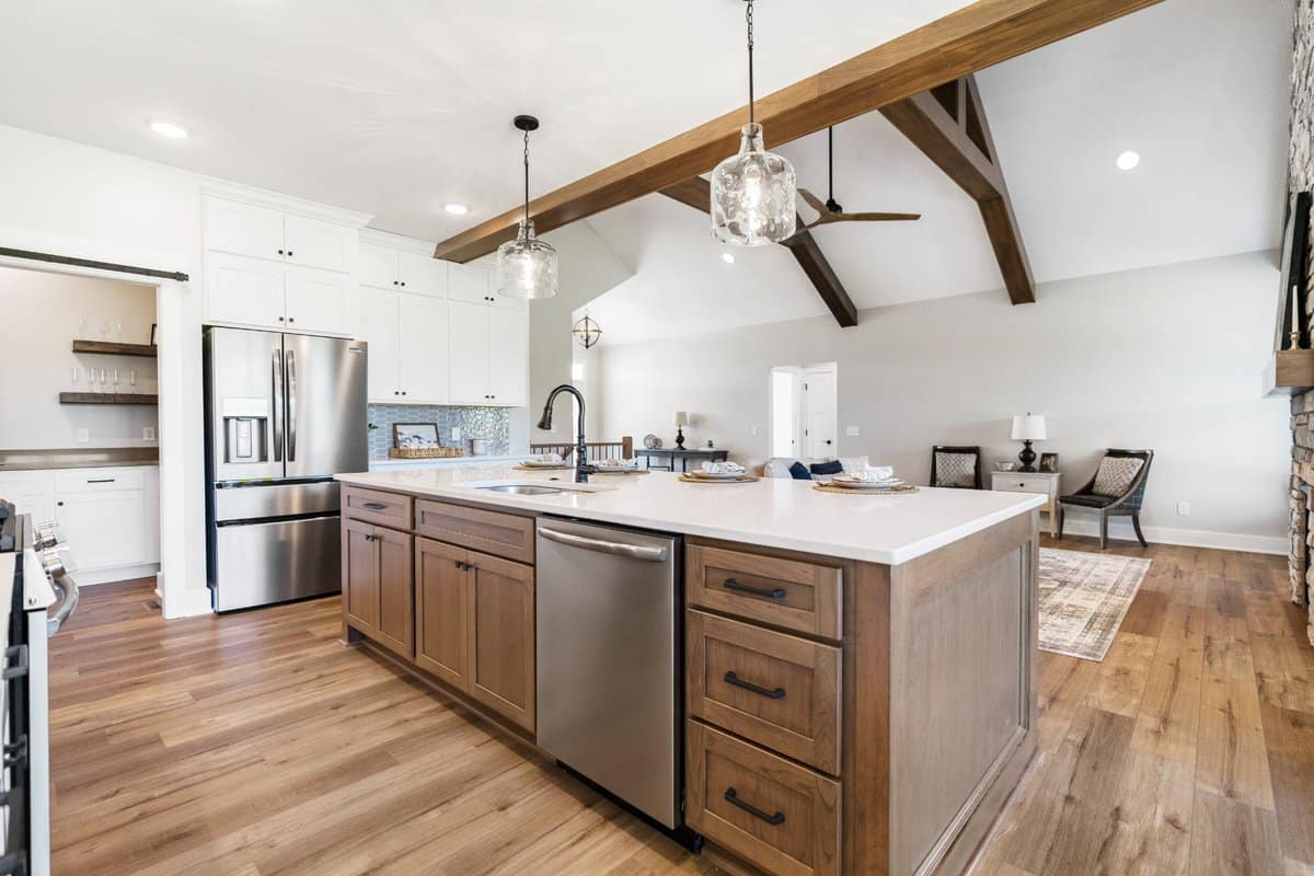 kitchen-island-vaulted-ceiling-exposed-beams-custom-home-portage-county