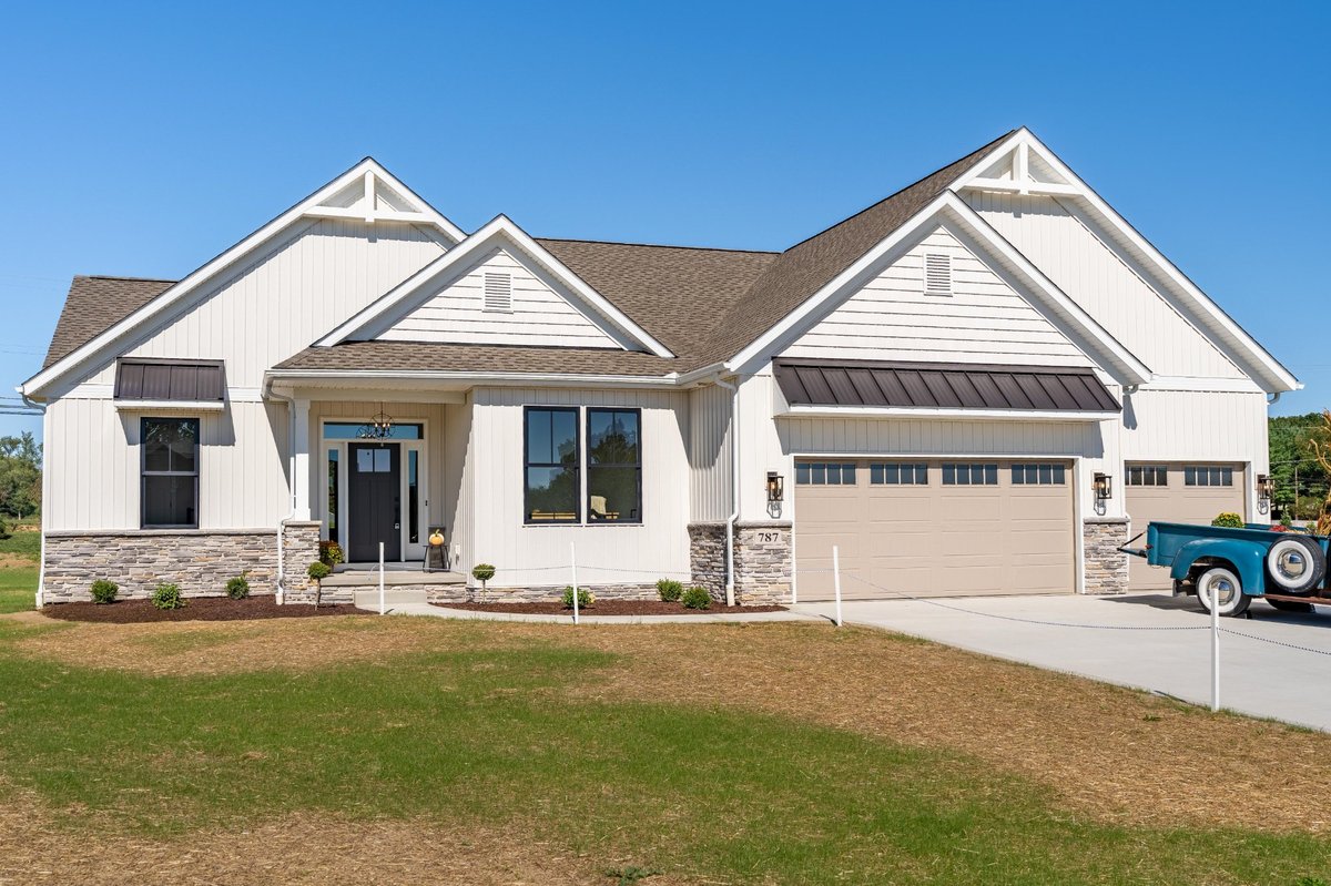 modern-farmhouse-stone-wainscot-white-siding-portage-county-builder