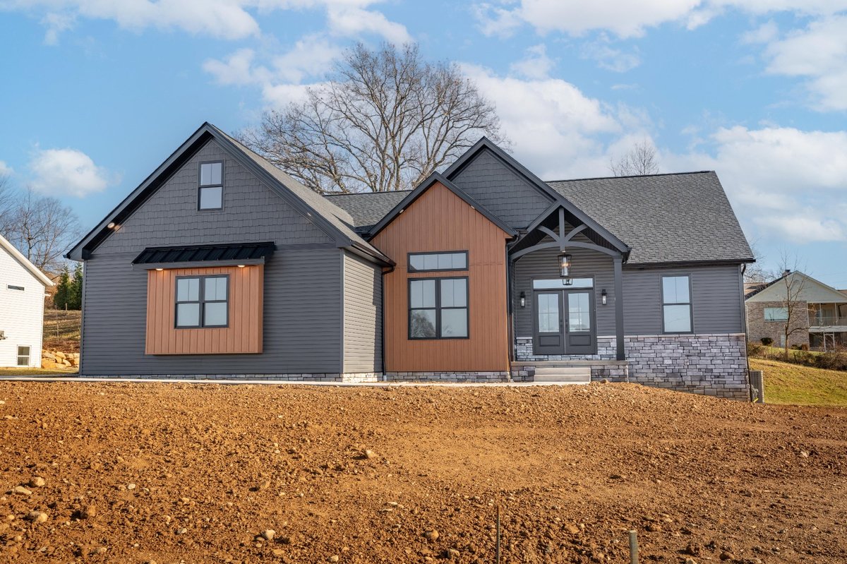 modern-ranch-home-mixed-siding-stone-accents-custom-builder-ohio