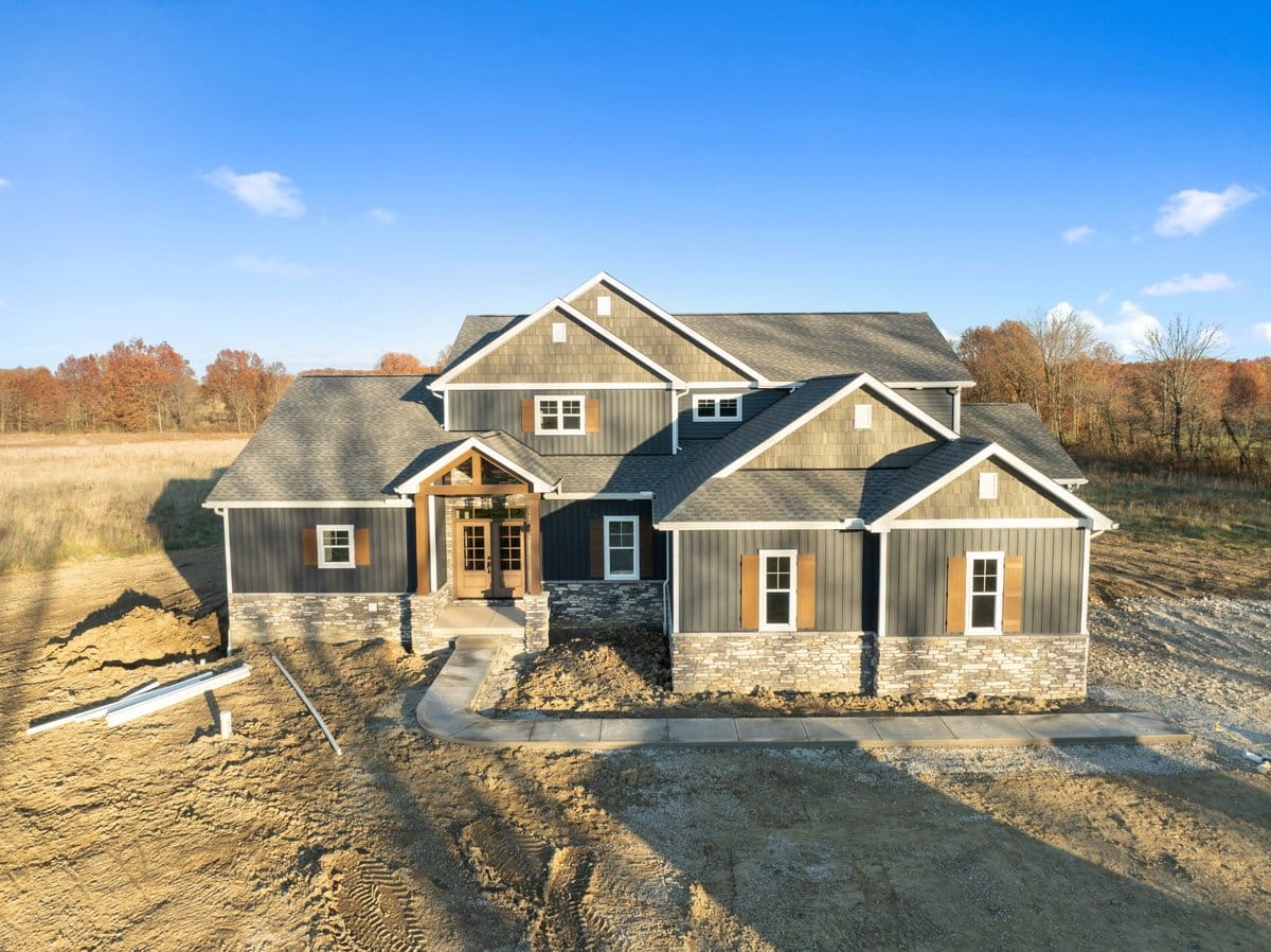 two-story-custom-home-stone-wainscot-metal-roof-hartville-ohio