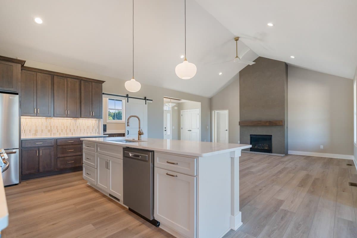 two-tone-kitchen-island-vaulted-ceiling-barn-door-stark-county-builder