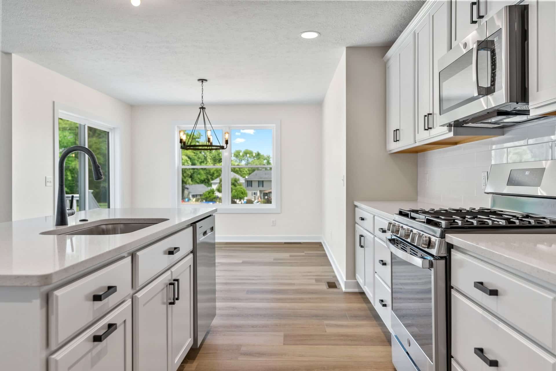 white-galley-kitchen-black-fixtures-plain-township-ohio