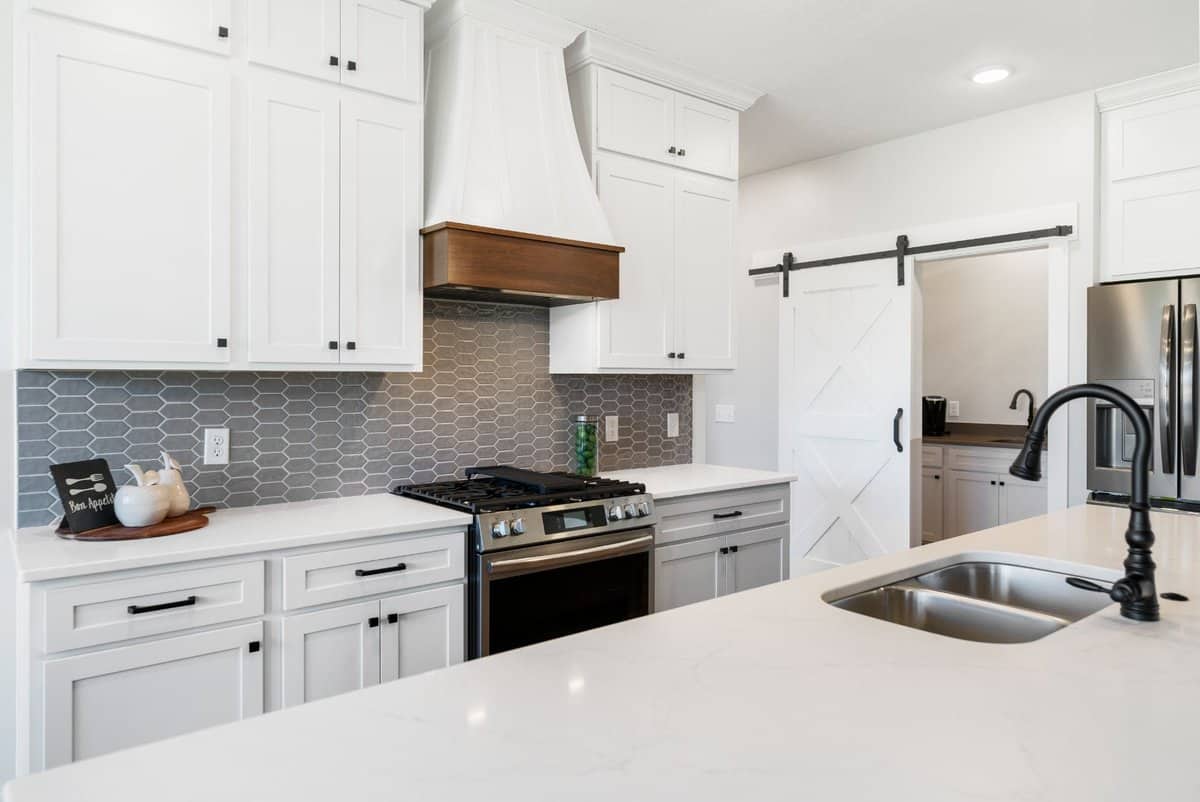 white-kitchen-hexagon-tile-backsplash-barn-door-pantry-lake-township-ohio