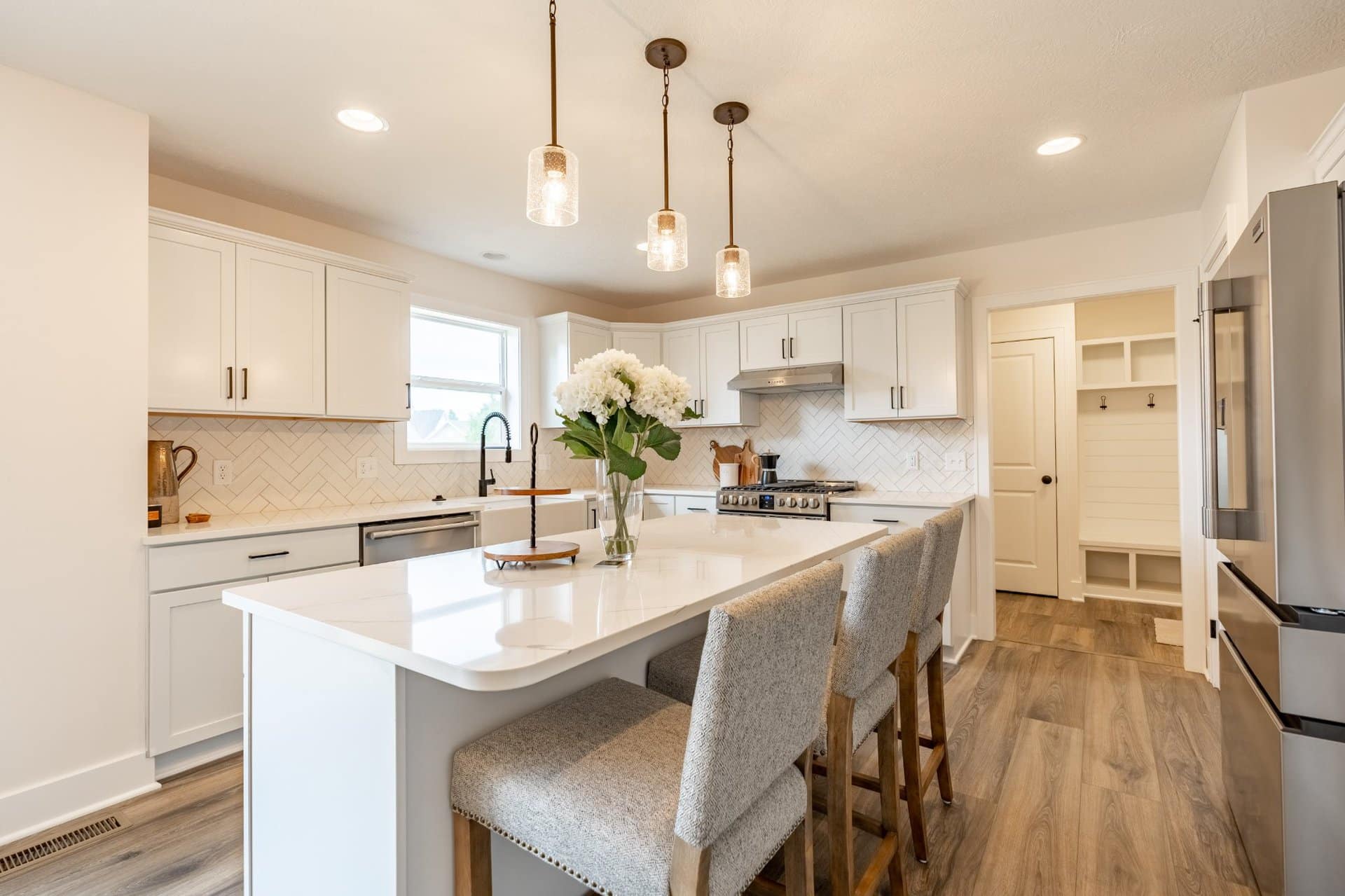 white-kitchen-island-seating-plain-township-custom-builder