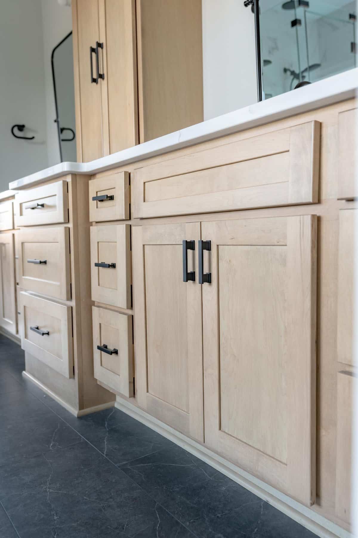 custom-bathroom-cabinetry-floating-vanity-black-hardware-portage-county