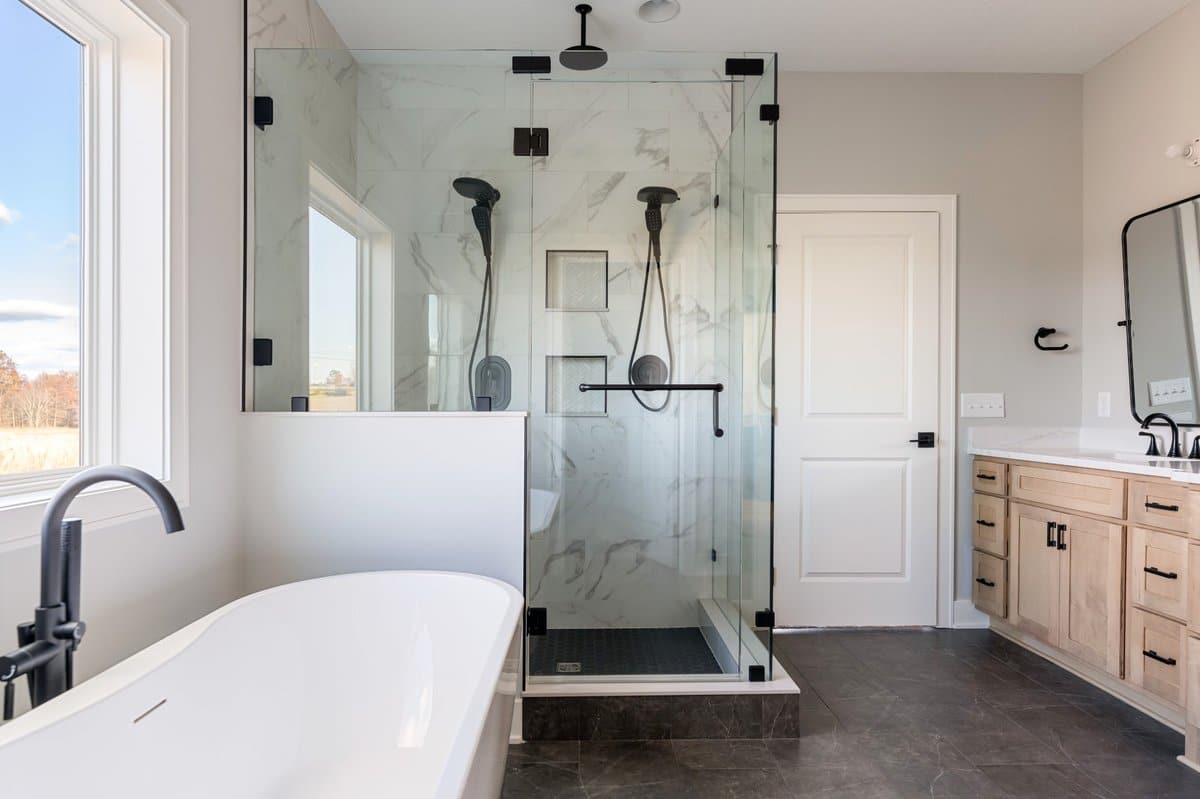 luxury-primary-bath-freestanding-tub-marble-shower-lake-township-ohio