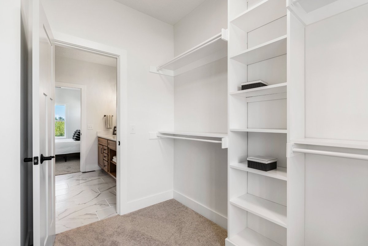 master-closet-custom-shelving-primary-suite-stark-county-builder