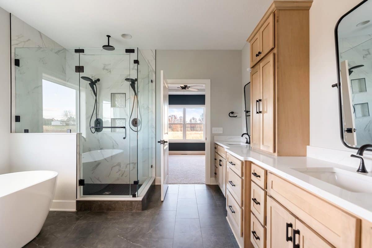 primary-bathroom-suite-dual-shower-freestanding-tub-custom-home-hartville