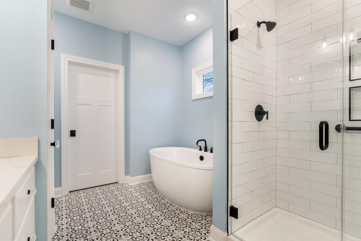traditional-bathroom-blue-walls-mosaic-tile-floor-plain-township