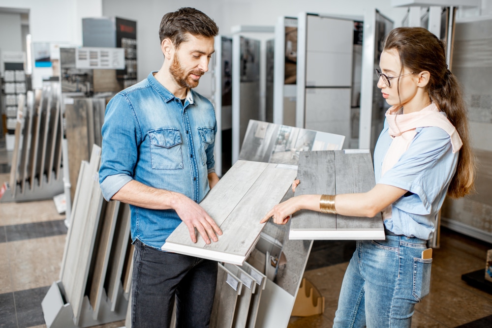 Beautiful,Young,Couple,Choosing,Ceramic,Tiles,For,Their,House,Repairment